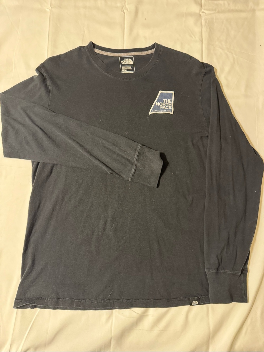 The North Face Black Long Sleeve Tee with Blue Logo Patch - Picture 2 of 6